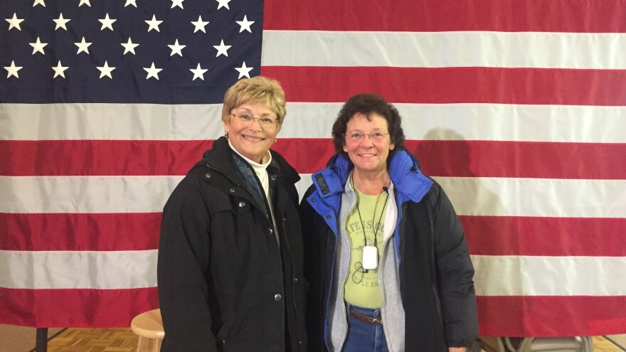 Linda Bimbo (left) and friend Muriel Charron attended John Kasich's Monday evening town hall in Kingston, N.H. "I really came in kind of undecided," Bimbo said. "But, I love this guy. I love his experience."