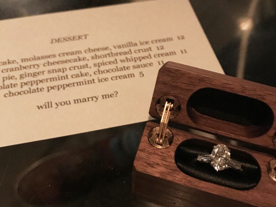 Kevin Biely proposed to Kat McClain over dessert a year to the day of their first date.