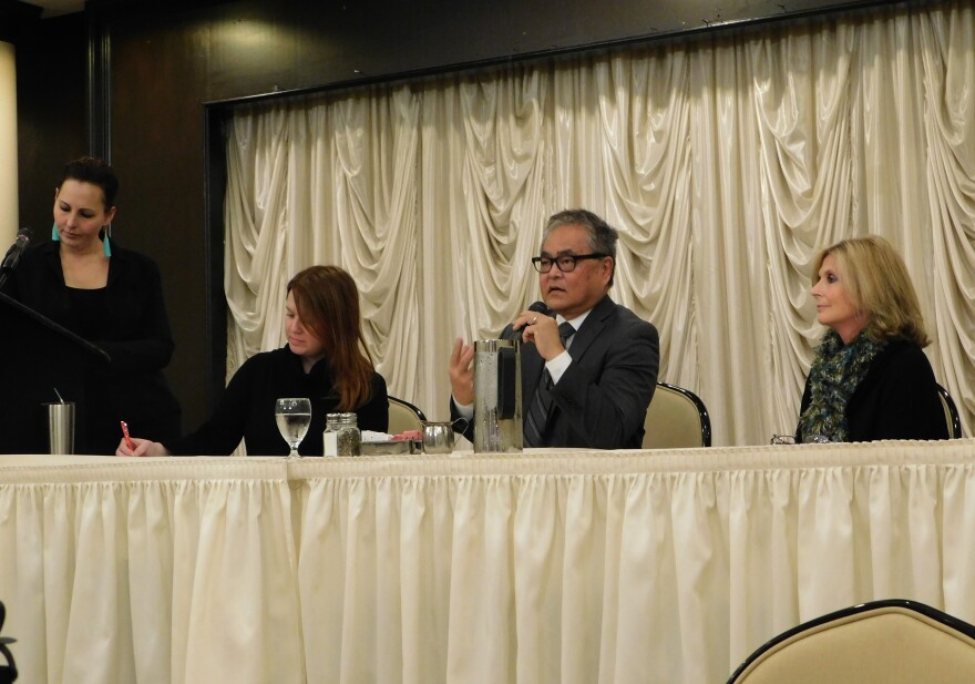 Akron photographer Shane Wynn moderates the panel of arts stakeholders at the Akron Press Club.