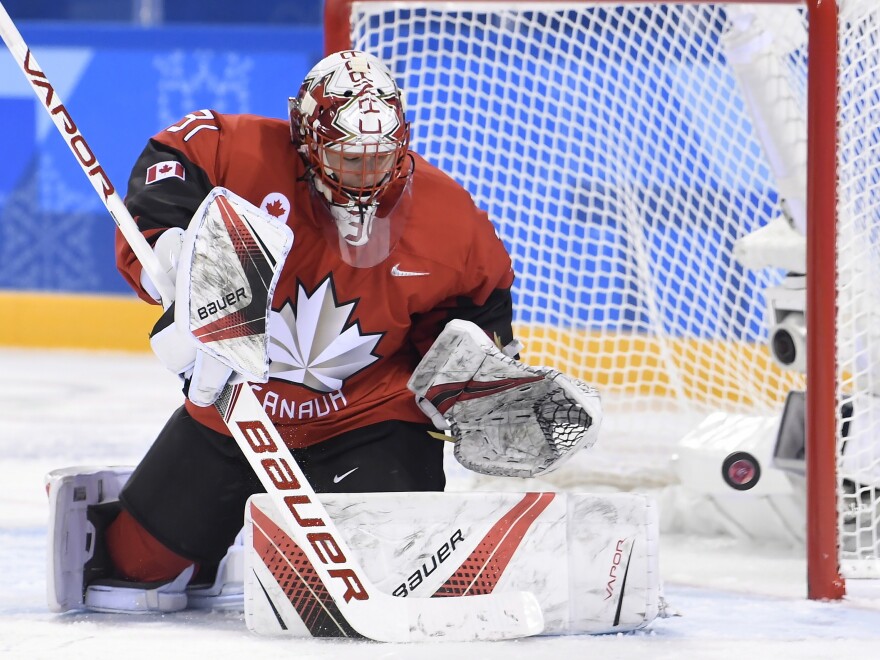 David Arrigo also designed the mask that Canada goaltender Genevieve Lacasse wore during the 2018 Olympics. Here she is playing against the U.S. national team during the preliminary rounds.