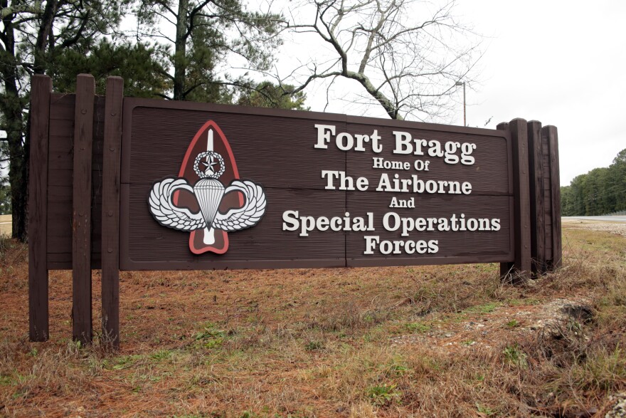 In this Jan. 4, 2020, file photo a sign for at Fort Bragg, N.C., is shown. The U.S. Army has quarantined 90 soldiers and instructors who tested positive for the coronavirus during a survival course at Fort Bragg.