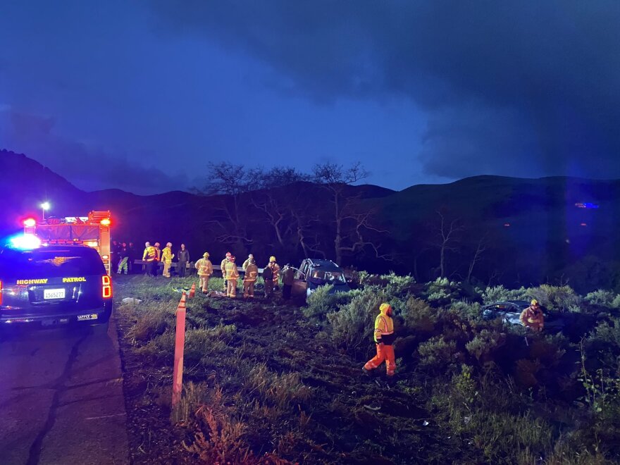 A traffic collision on the Central Coast sent two responding firefighters to hospitals, after they were hit by a passing vehicle.