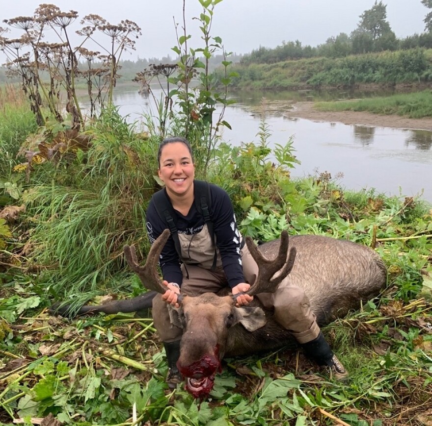 Mindy Heyano with a bull moose. August 2021.