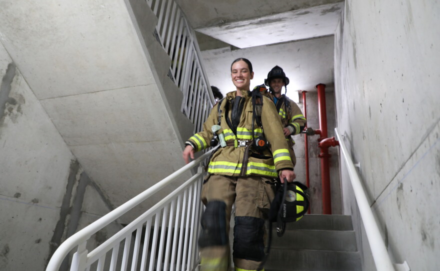 Firefighters take part in the 9-11 stair climb at Navarre Beach.
