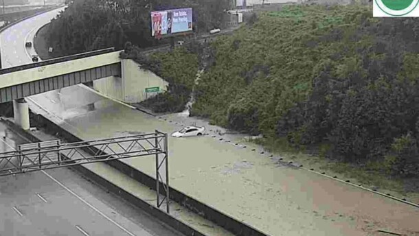 A portion of I-71 at Ridge Ave flooded Friday night during a severe rainstorm.