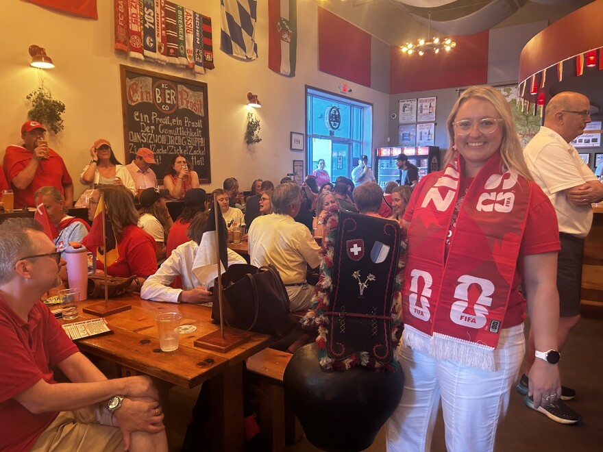 Sarah Knechtenhofer, right, cheers on Team Switzerland at a watch party Saturday at KC Bier Co.