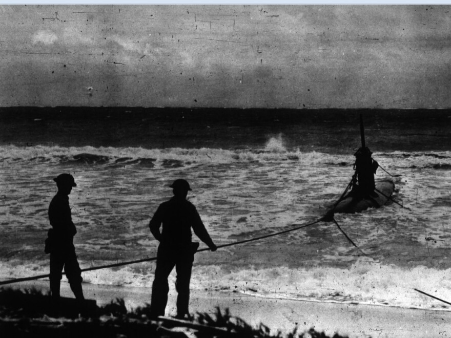 An American hauls in a HA-19 Japanese submarine following the attack on Pearl Harbor in 1941. Submarine warfare would prove crucial during WWII.