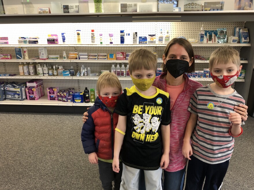 This family drove from the Madison area to Milwaukee's Infinity Pharmacy to get 7-year-old Jeremy and 5-year-old Sam vaccinated.