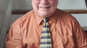 David Gloss sitting on stairs