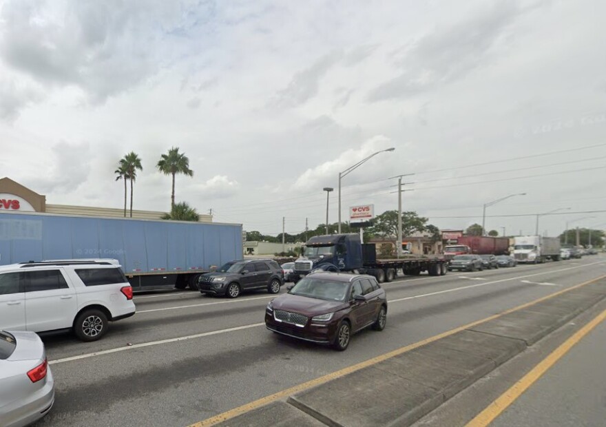 Truck and vehicular traffic on State Route 70 in Okeechobee.