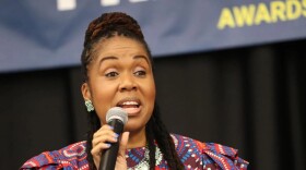 Monique Worrell speaks during an NAACP banquet