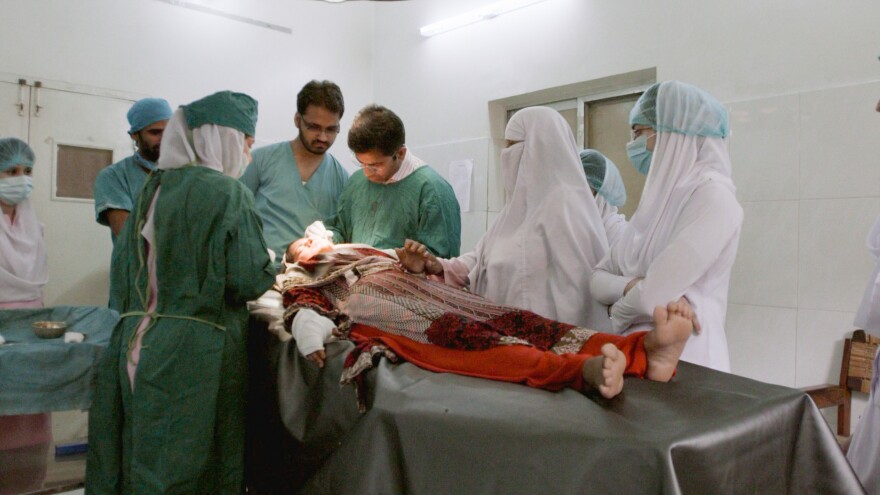 Saba, who was shot in the face and the hand, was able to pull herself out of the river and get to a hospital.