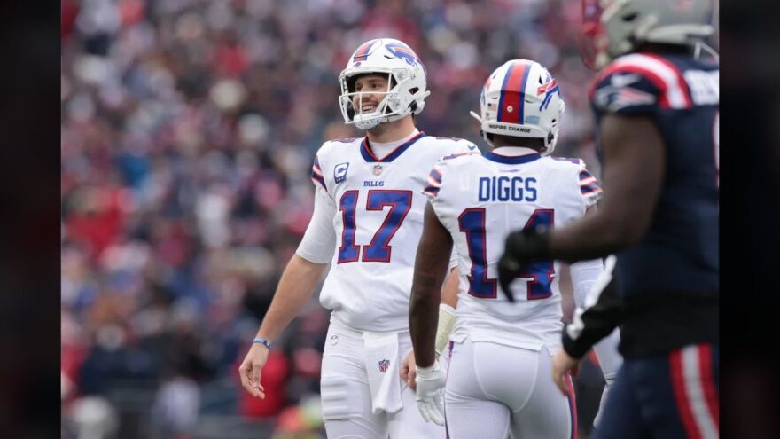 Josh Allen (17) threw for three touchdowns against the New England Patriots at Gillette Stadium Sunday.