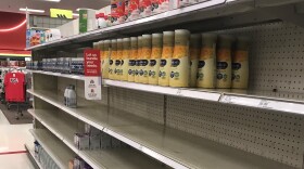 Nearly-bare shelves are seen in the formula aisle at a Target store in Monroe.