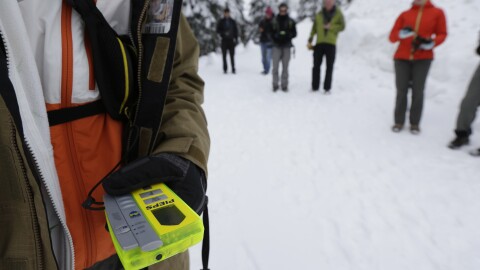 In this Jan. 4, 2013 photo, Students using avalanche scanners look for a target during an avalanche safety course held on Snoqualmie Pass in Washington state. Where backcountry safety education once stressed the mechanics of avalanches and snow science, training courses now incorporate a focus on human factors such as how to make better decisions, manage group dynamics and speak up should danger arise.