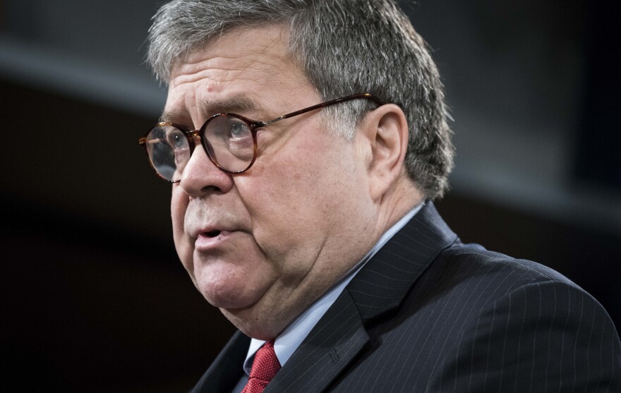 Attorney General William Barr, pictured during a news conference on Monday, tells ABC News that President Trump should stop his commentary about ongoing Justice Department cases.