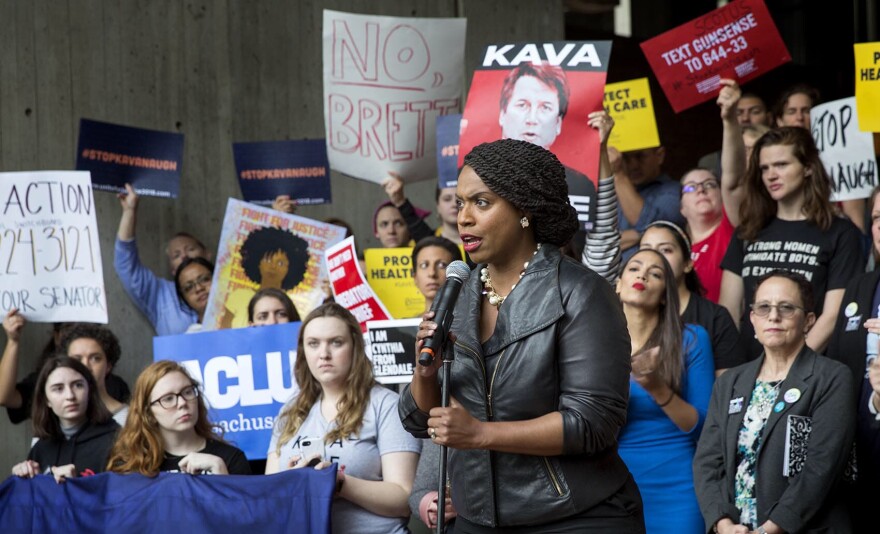 Ayanna Pressley addresses the rally. (Robin Lubbock/WBUR)