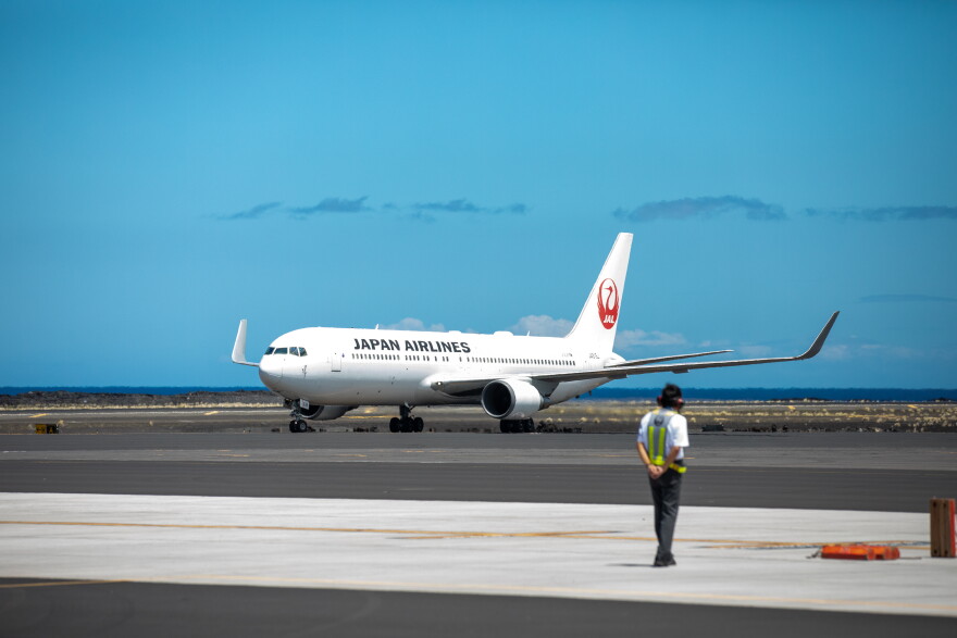 A Japan Airlines flight arrives in Kona on Aug. 2, 2022.