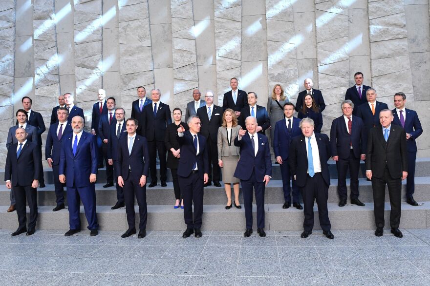 Leaders of NATO member nations pose for a photo at NATO headquarters in Brussels on March 24.