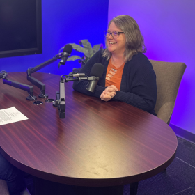 Long View Host, Joe Atkinson, sits across a table from Heather Kelsey, EVPL.