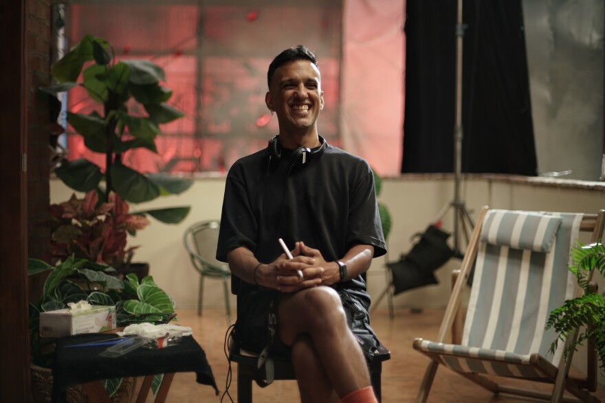 A man sits in a chair