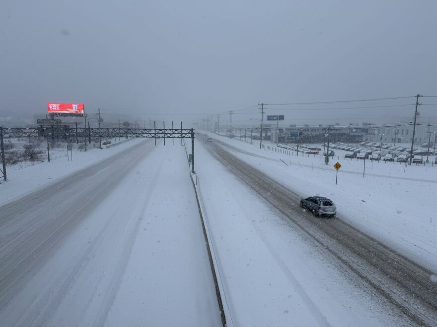 Independence Boulevard at Idlewild Road is covered with snow at 4:30 p.m., Jan. 31. 2026.