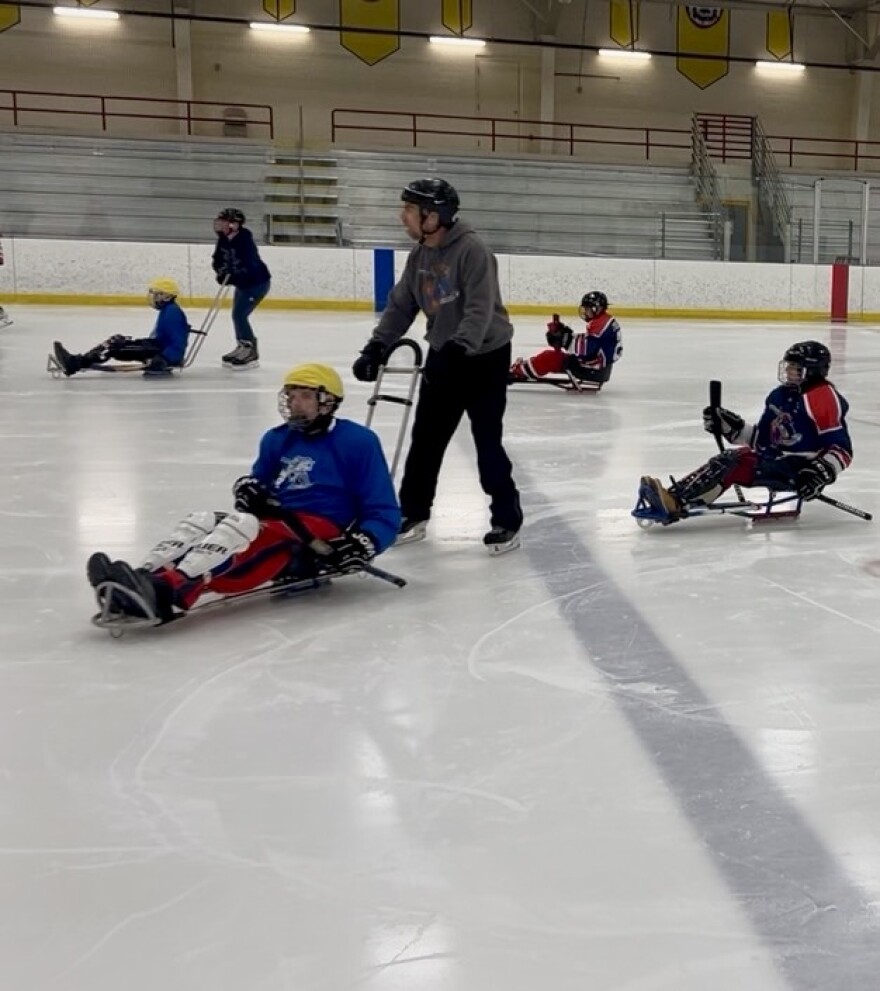 Team players begin a scrimmage
