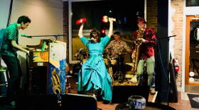 Tom Merrigan's Hot Raccoons display their onstage musical antics.
