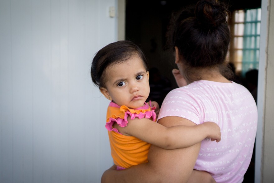 Beniquez's granddaugther Kamila Rubi Rios Beniquez, 1, and her mother, Astrid Beniquez.
