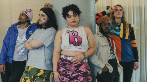 Photo of Blaised and Confused posed around a round pillar