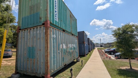 The long line of double-stacked containers behind SOMO Walls will be transformed by some of the community's most talented muralists.