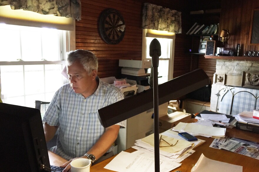 Rob Goldman, co-owner of the New York State Marine Highway Transportation Company, works in his office in Troy, N.Y.