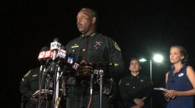 Orange County Sheriff Jerry Demings speaks at a news conference about a 2-year-old boy who was dragged into the water by an alligator on the shores of Disney's Grand Floridian Resort & Spa Tuesday night in Orlando. The family of five from Nebraska was on vacation and wading in a lake Tuesday evening when the attack happened, Demings told a news conference. The father tried to rescue his son but was unsuccessful, Demings said. (Christal Hayes/Orlando Sentinel via AP)