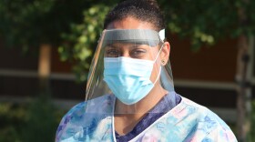 Hashi Price is a certified nursing assistant at the Providence Transitional Care Center, the site of Alaska's largest coronavirus outbreak. Price has worked for Providence for 10 years. Photographed outside of her workplace on Tuesday, June 30, 2020. (Tegan Hanlon/Alaska Public Media)