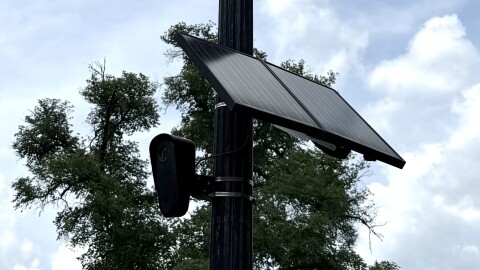 Flock camera on a lighpole on High Street near the Ohio State Union Parking Garage