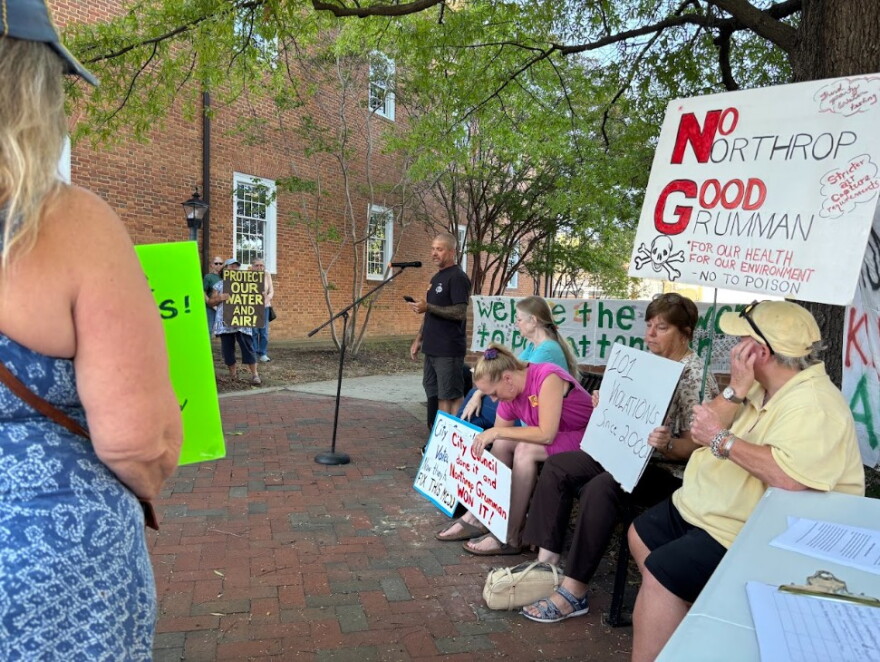 Milio Curcio, an Augusta County resident whose seven-acre homestead abuts Northrop Grumman, speaks at Monday night's rally. "It keeps us up at night for sure," Curcio says.