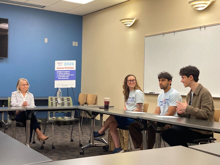 Rep. Mariannette Miller-Meeks talks with Cancer Action Network volunteers at the Iowa City Public Library on Aug. 31, 2026.