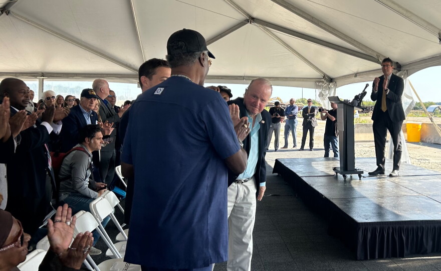 Gov. Matt Meyer celebrates the port groundbreaking.