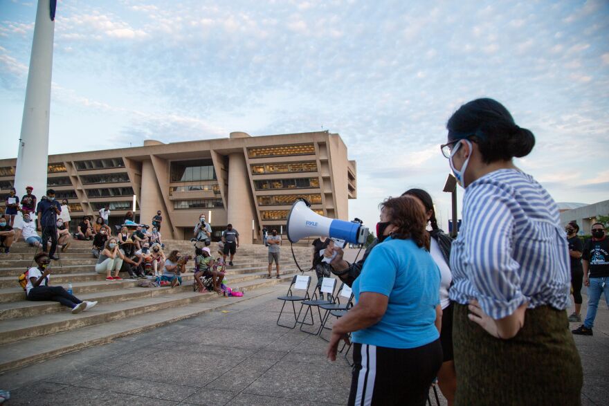 In 2020, the Dallas organization Our City Our Future loudly called for a major cut to the Dallas Police Department’s budget, alongside local police reform activists. They hosted events where community members gathered at Dallas City Hall to demand the city spend money to fix their communities.