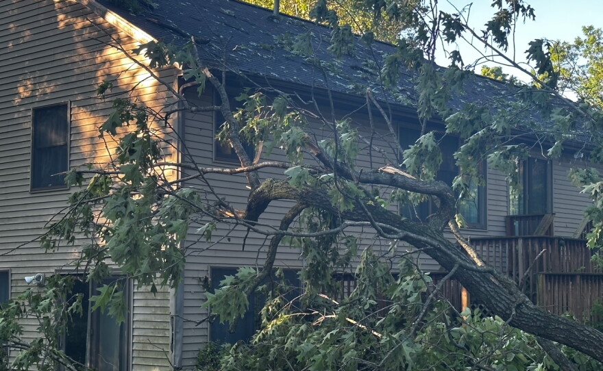 Powerful winds Thursday night knocked trees onto streets, power lines and homes across Michiana Thursday night, like this home in the Dunlap area in Elkhart County.