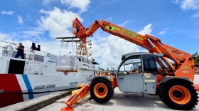The U.S. Coast Guard Forces Micronesia/Sector Guam engineering team and the USCGC Oliver Henry (WPC 1140) crew load 4,500 pounds of emergency rations aboard the cutter to be taken to Rota, CNMI on July 14, 2025.