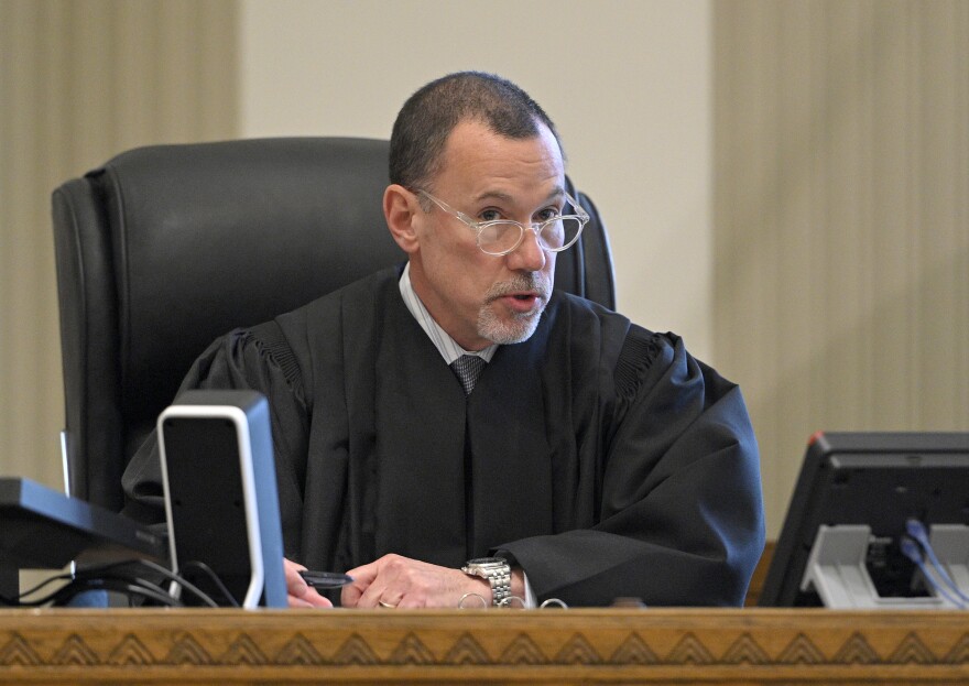 Jackson County Circuit Court Judge J. Dale Youngs explains his findings before announcing that he found Eric DeValkenaere, a Kansas City police detective, guilty in the fatal December 2019 shooting of Cameron Lamb.