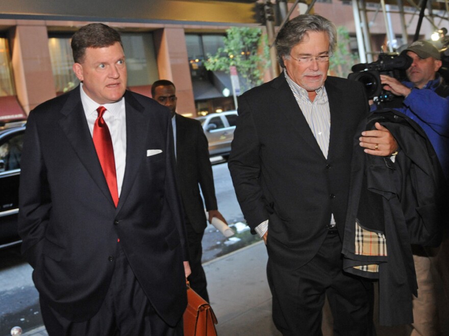 Oklahoma City Thunder owner Clay Bennett (left) and Miami Heat owner Micky Arison arrive at a midtown hotel where NBA labor talks were held Nov. 5 in New York City.