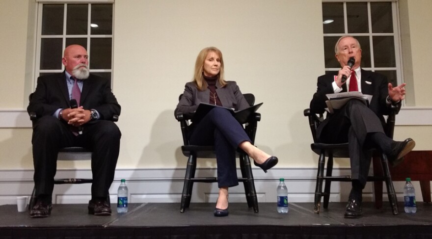 Davidson mayoral candidates (from left) Rusty Knox, Laurie Venzon and John Woods debated Wednesday at Davidson College. 