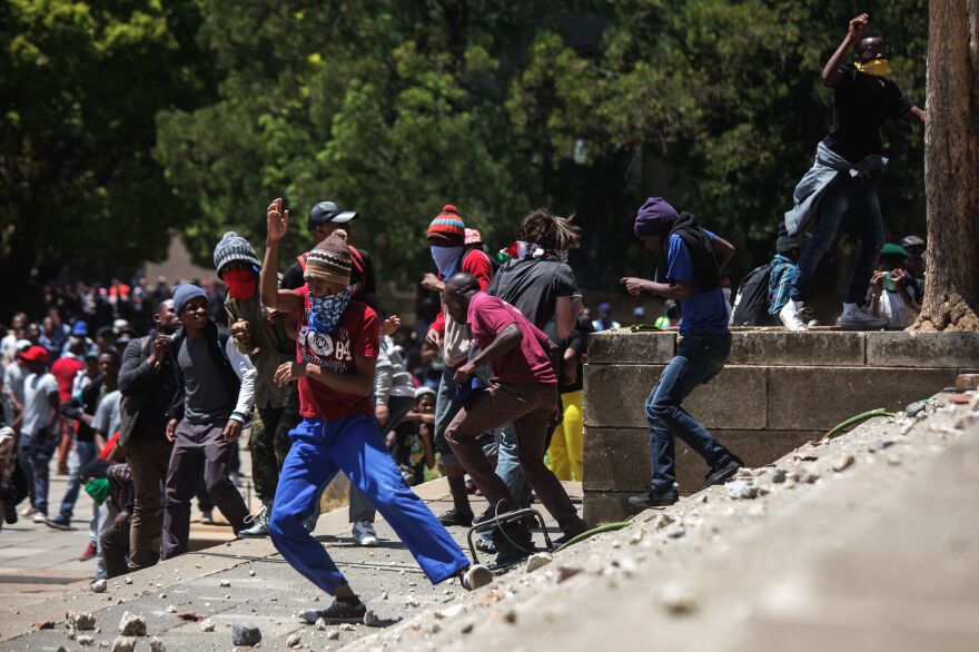 Amid growing tension over tuition fees, violent clashes with police have erupted regularly on campuses across South Africa in recent months, and several universities have been closed to avoid further unrest. At Wits University on Monday, protesters throwing rocks were dispersed by riot police using tear gas, rubber bullets and stun grenades.