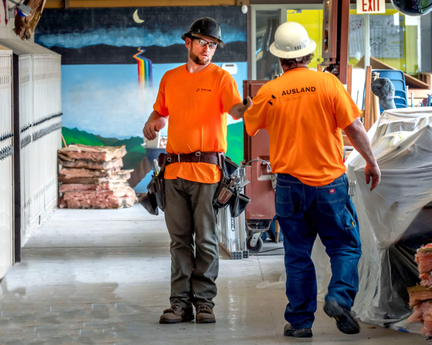 Workers on a pre-pandemic renovation at Lincoln Middle School in Cottage Grove.