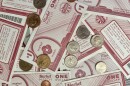 A pile of Market Match money and some change