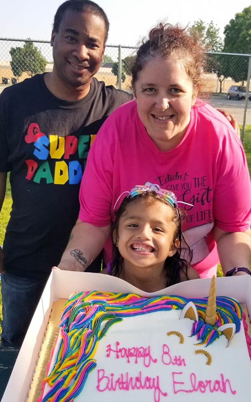 Craig and Amanda Farrell with their daughter Elorah in July 2019.