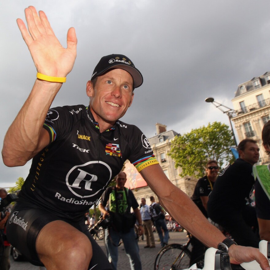 Lance Armstrong waved to fans after the final stage of the Tour de France, last July in Paris.