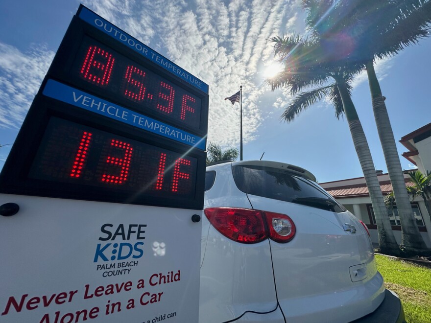 Outside temperature is displayed in comparison to the inside temperature of a vehicle on Thursday June 26, 2025 in Belle Glade, Fla. during an event to raise awareness about the dangers of leaving children unattended in vehicles.